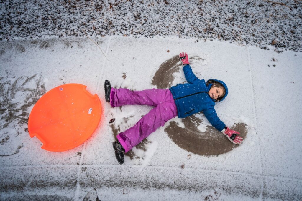 Cure for Cabin Fever - a child making Snow Angel