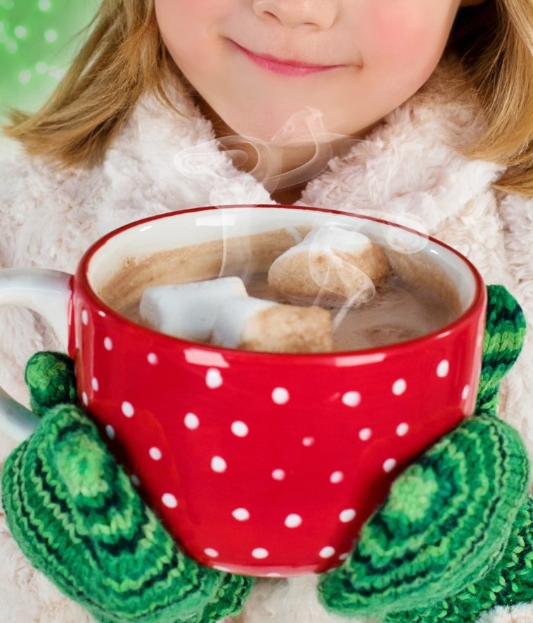Young girl bundled up for Winter wth Hot Chocolate