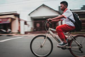 boy riding bicycle