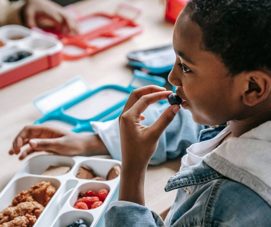 boy eating lunch at school